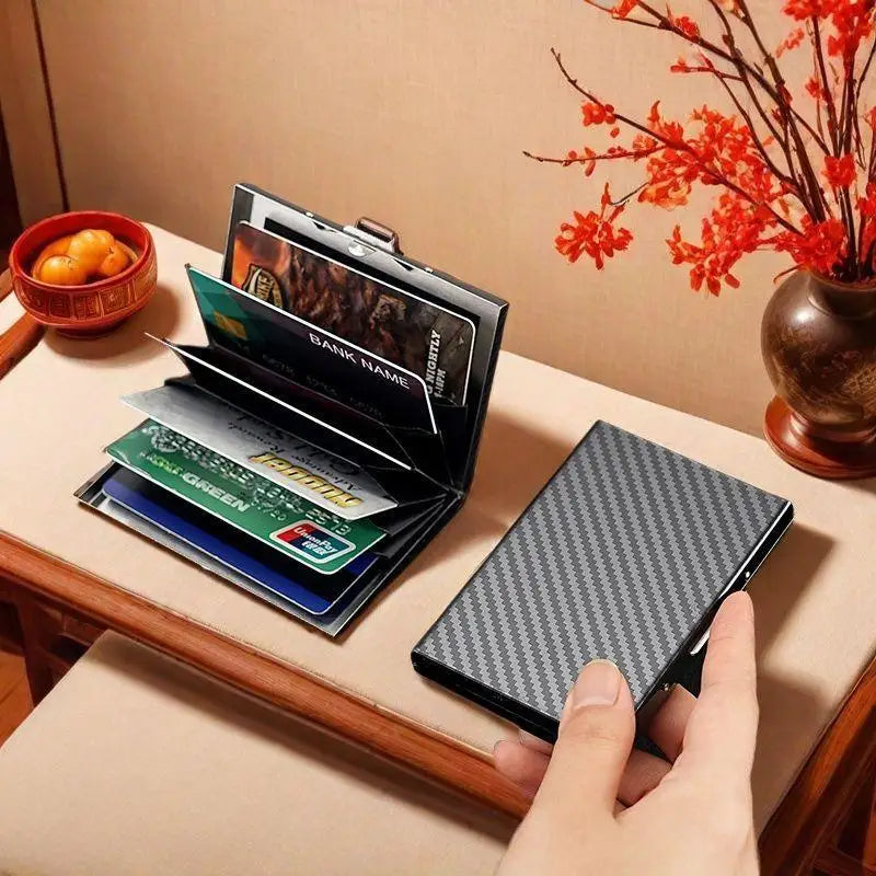 Compact Carbon Fiber Effect Aluminum RFID Card Holder with Clip Closure and Sleek Unisex Design