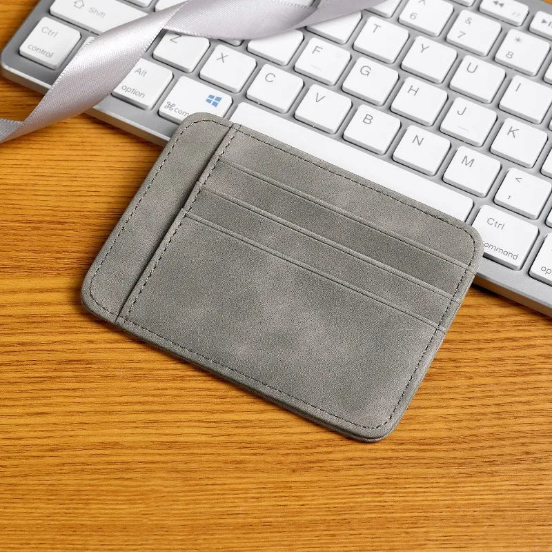 Ultra-slim faux leather card holder with multiple compartments for men and women