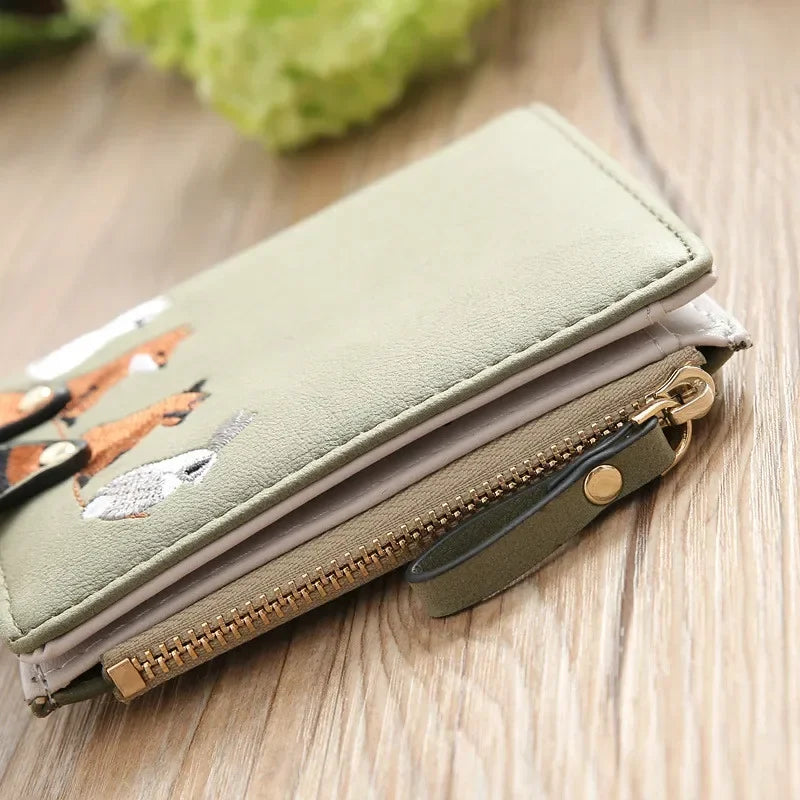 Compact Women's PU Leather Wallet with Animal Print and Secure Zip Closure Image