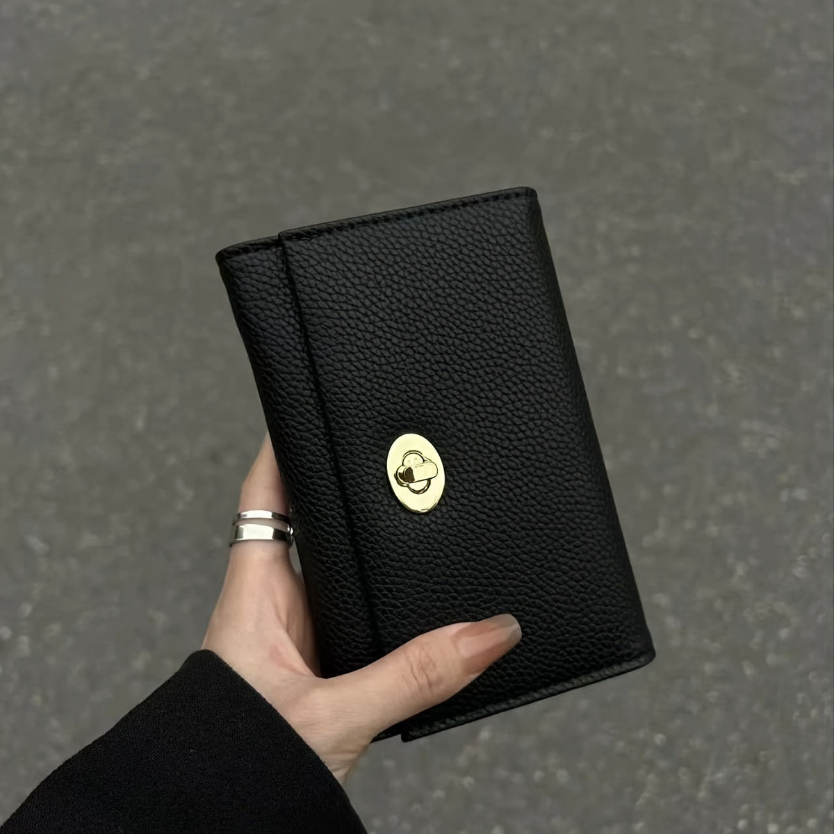 Compact Black Women's Wallet with Gold Turn Lock Image