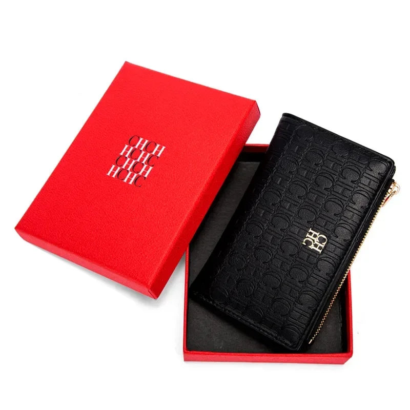 Long women's wallet in textured PVC leather with zip closure and elegant design